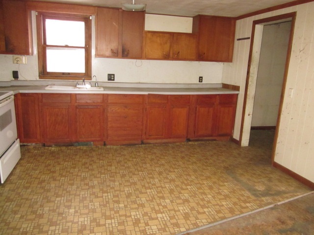 8982 East Maize Road Rock City, IL 61070 - Photo 15 of 25 a bathroom with a sink and a large mirror