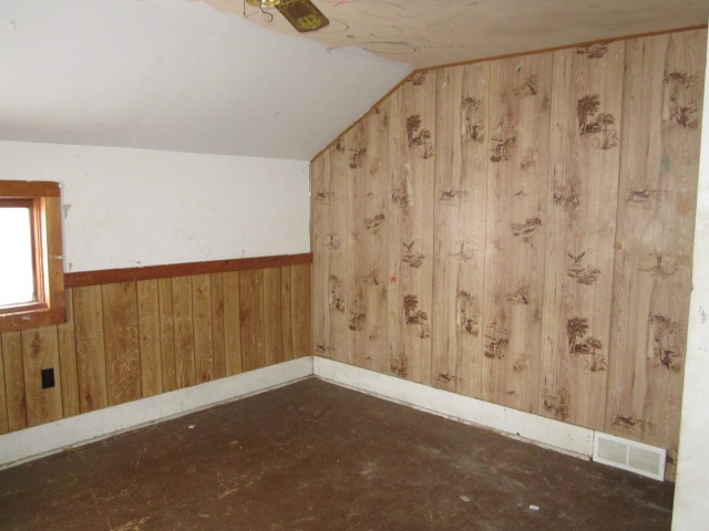 8982 East Maize Road Rock City, IL 61070 - Photo 19 of 25 a view of a room with wooden walls