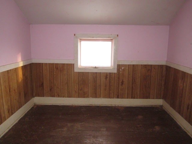 8982 East Maize Road Rock City, IL 61070 - Photo 20 of 25 an empty room with wooden floor