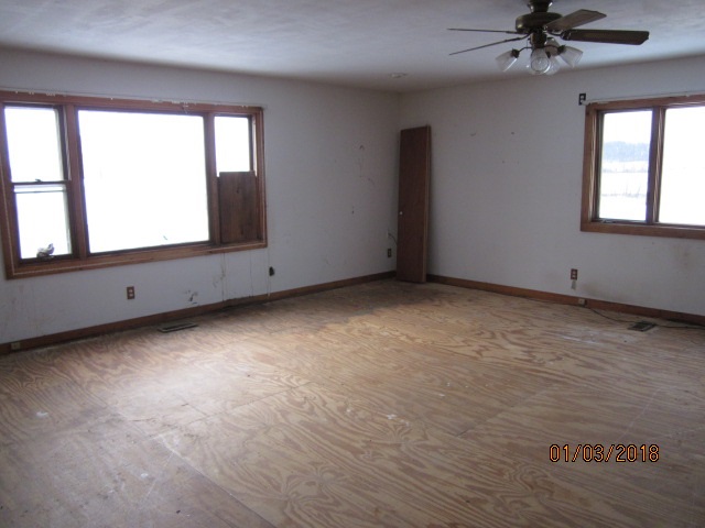 8982 East Maize Road Rock City, IL 61070 - Photo 21 of 25 an empty room with a window