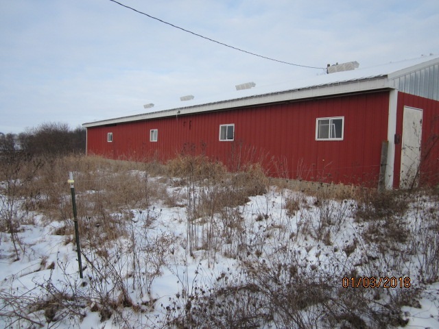 8982 East Maize Road Rock City, IL 61070 - Photo 5 of 25 a front view of a house