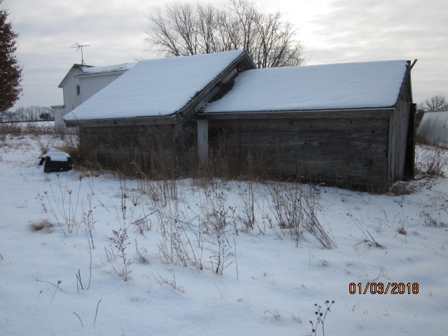8982 East Maize Road Rock City, IL 61070 - Photo 8 of 25 a front view of house with a yard