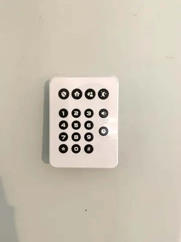 a front view of a house with a yard and glass windows