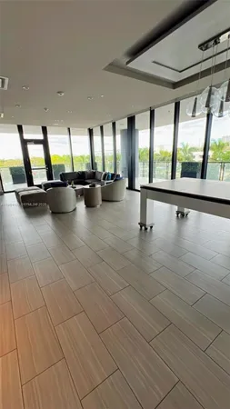 a view of swimming pool with furniture