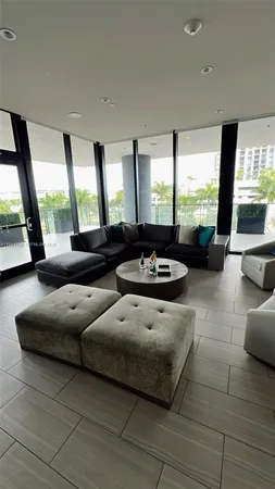 a view of a lake with houses in the back