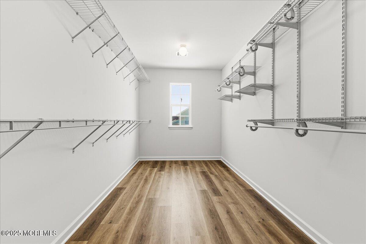 10 Sunshine Way Jackson, NJ 08527 - Photo 26 of 50 a view of a room with racks on the wall