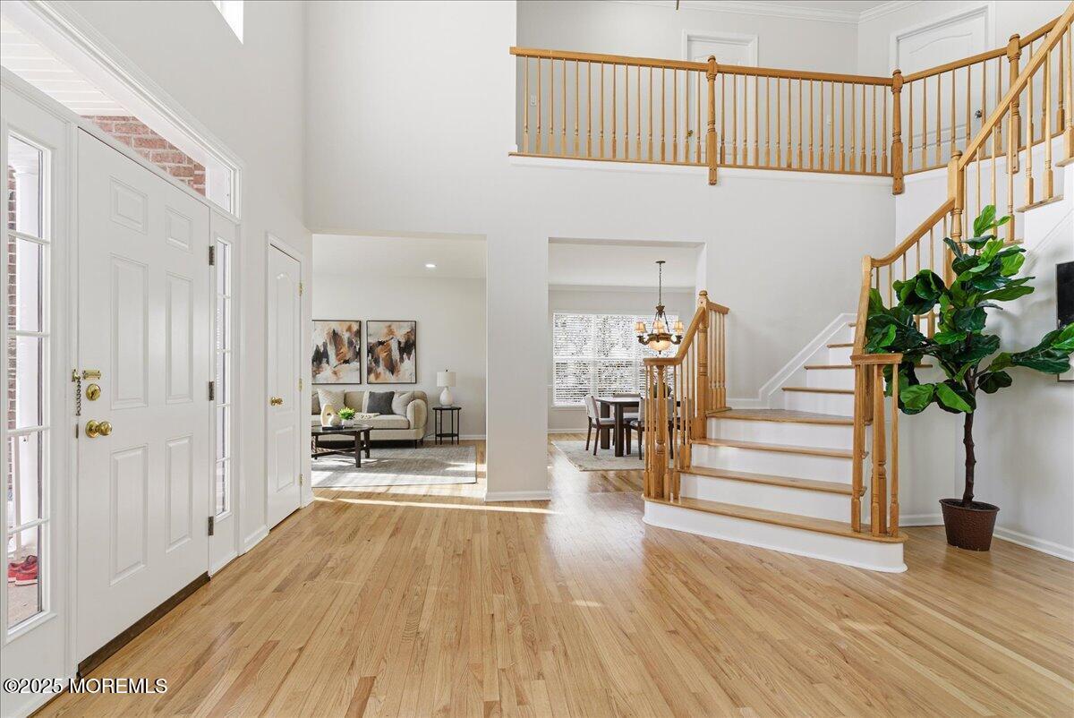 10 Sunshine Way Jackson, NJ 08527 - Photo 3 of 50 a view of entryway and hall with wooden floor