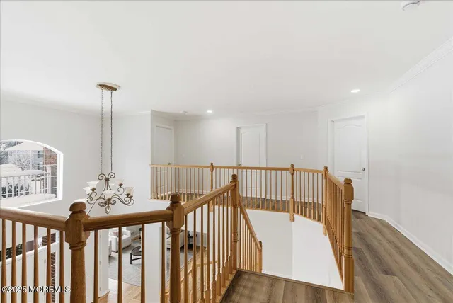a view of entryway with wooden floor
