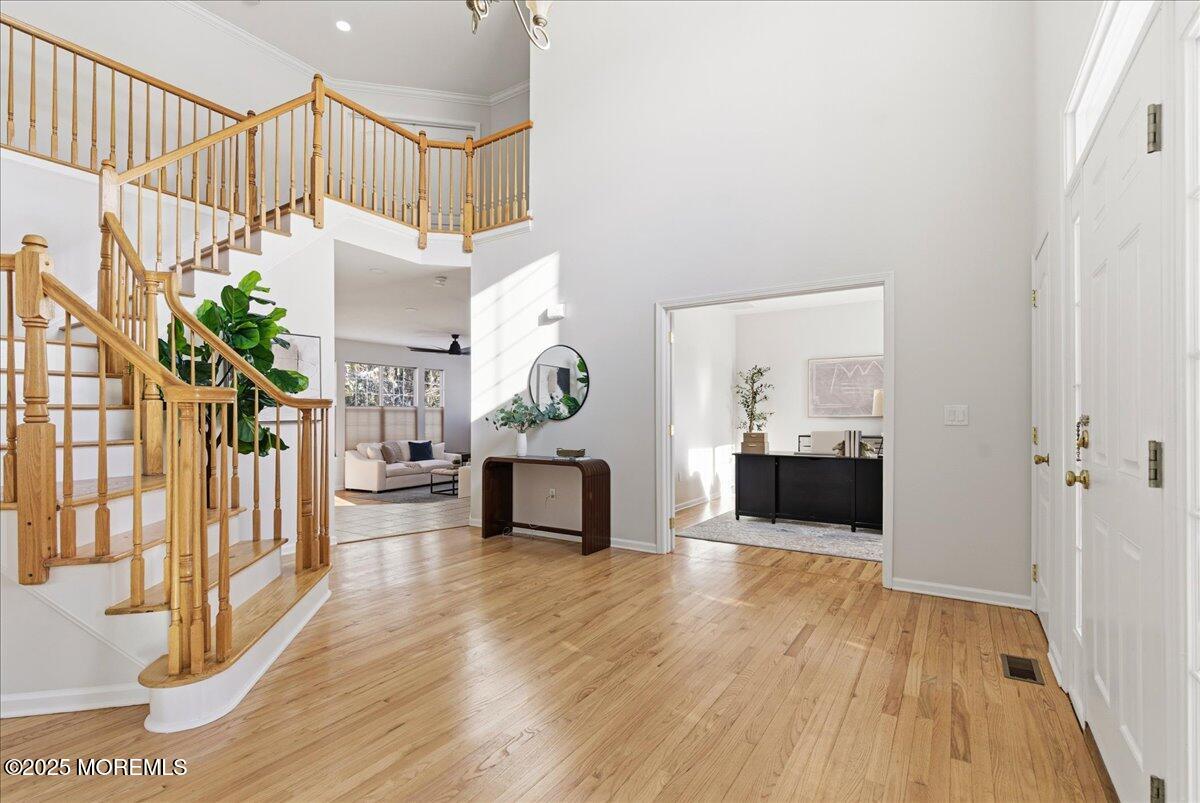 10 Sunshine Way Jackson, NJ 08527 - Photo 4 of 50 a view of entryway livingroom and hall with wooden floor