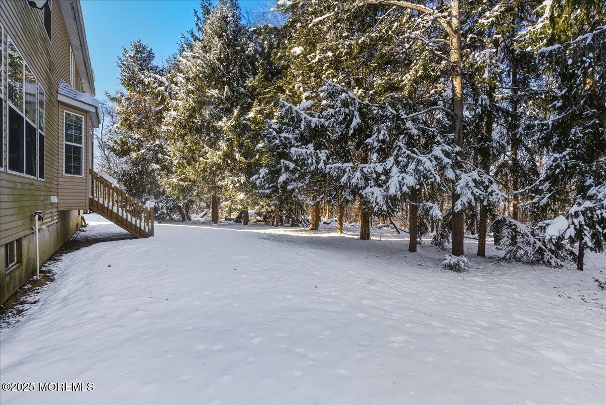 10 Sunshine Way Jackson, NJ 08527 - Photo 44 of 50 a view of a tree is middle of a building