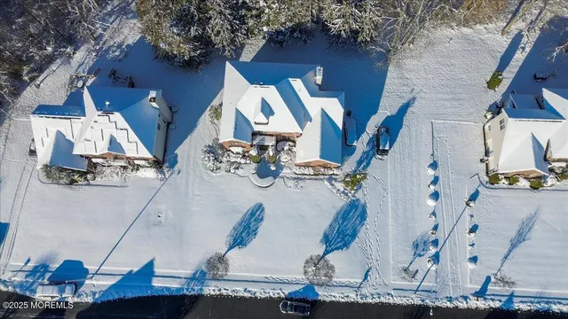 a view of living room with furniture and wooden floor