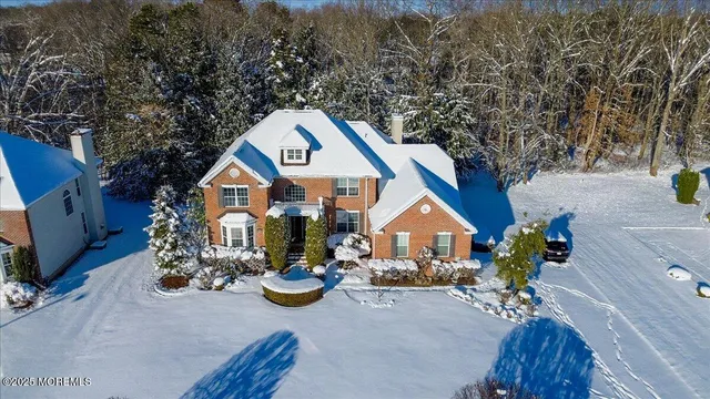 a view of house with outdoor space and sitting area