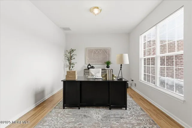 a dining room with table and chair