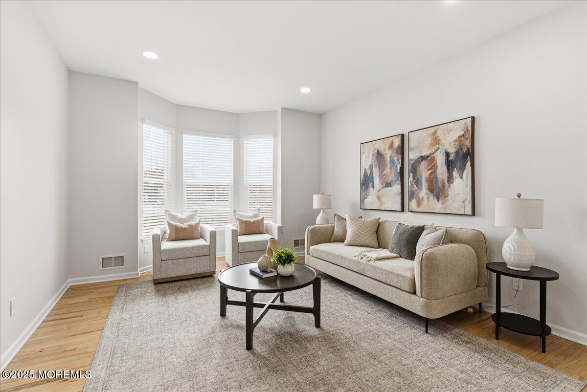 10 Sunshine Way Jackson, NJ 08527 - Photo 6 of 50 a living room with furniture and a large window
