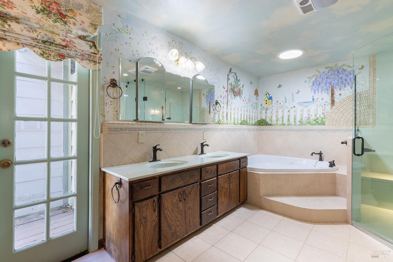 2236 West Hearn Avenue Santa Rosa, CA 95407 - Photo 29 of 56 a bathroom with a tub sink and mirror