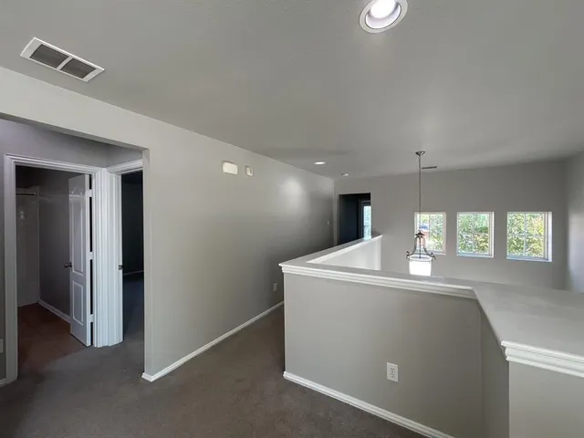 a view of a house and a kitchen