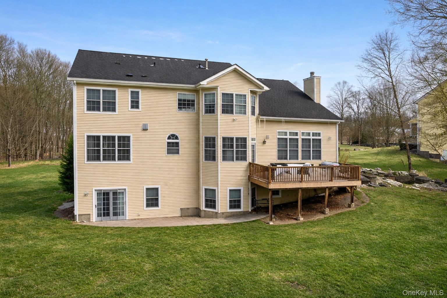 22 Ridgemont Drive Hopewell Junction, NY 12533 - Photo 38 of 43 a view of a house with a yard and sitting area