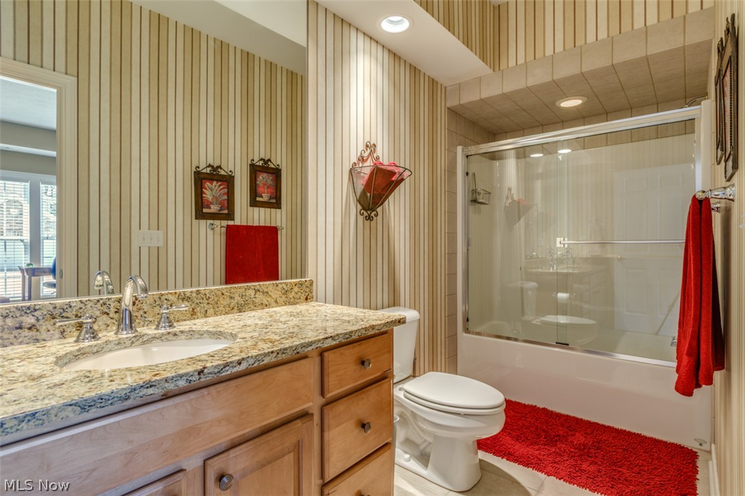 322 Burwick Road Cleveland, OH 44143 - Photo 14 of 25 One of the 4 1/2 Baths, they are all have granite countertops and ceramic flooring! This one is on the first floor off of the bedroom/study.