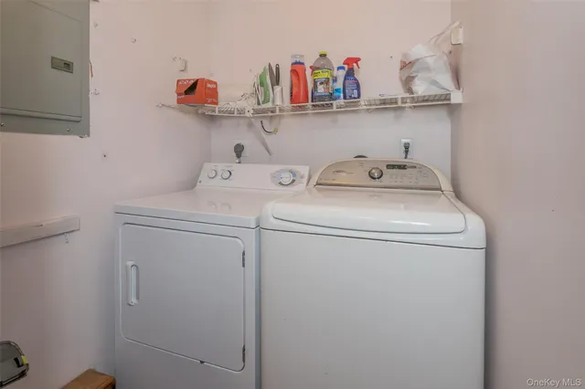 a utility room with dryer and washer