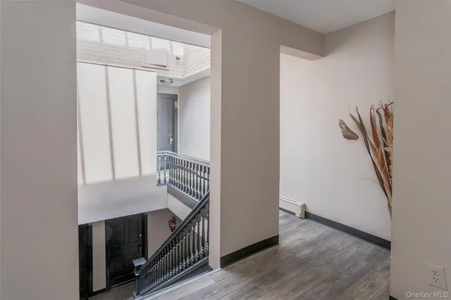 a view of a hallway with entryway