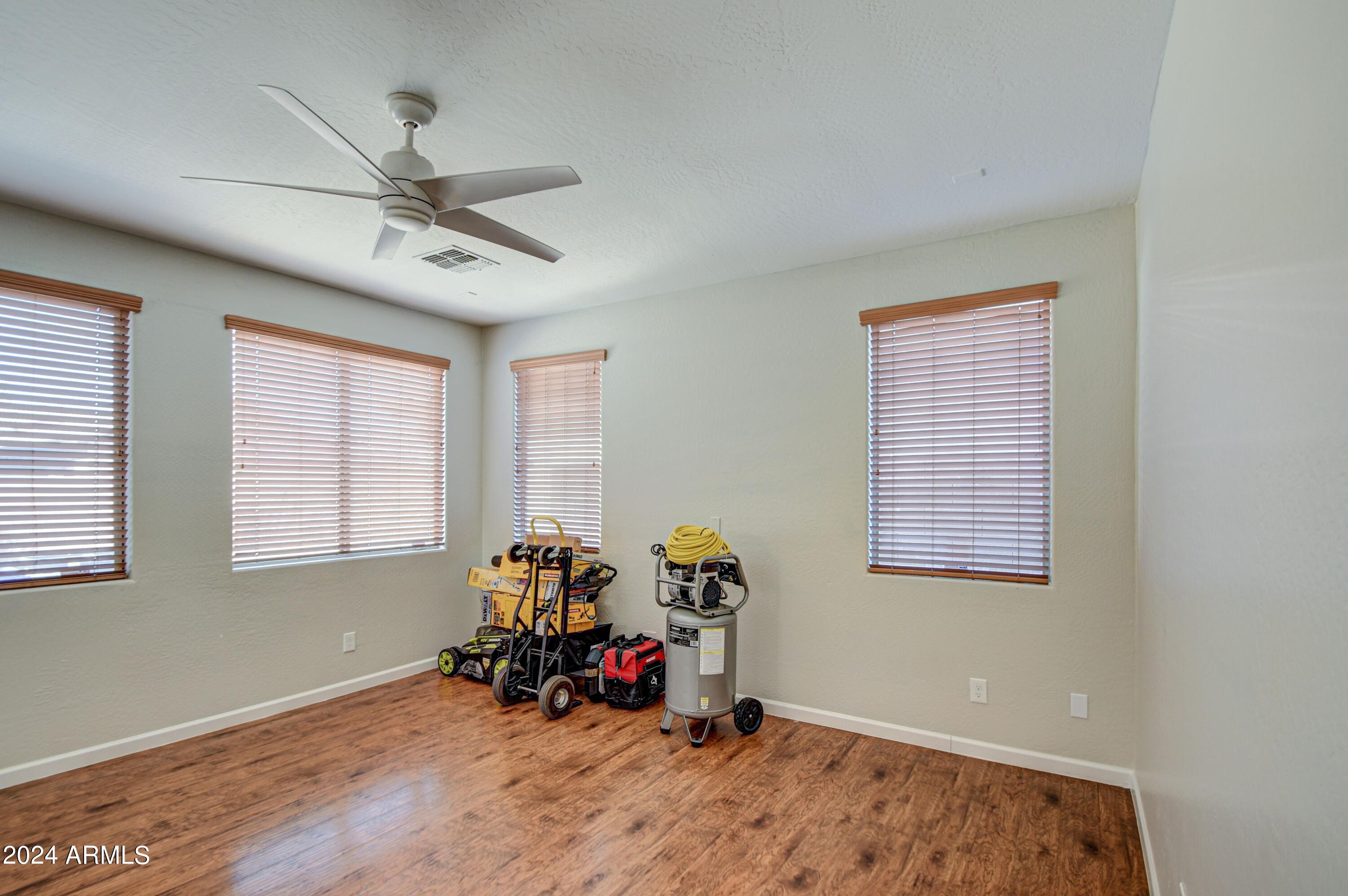 8844 West Cordes Road Tolleson, AZ 85353 - Photo 11 of 30 living room1
