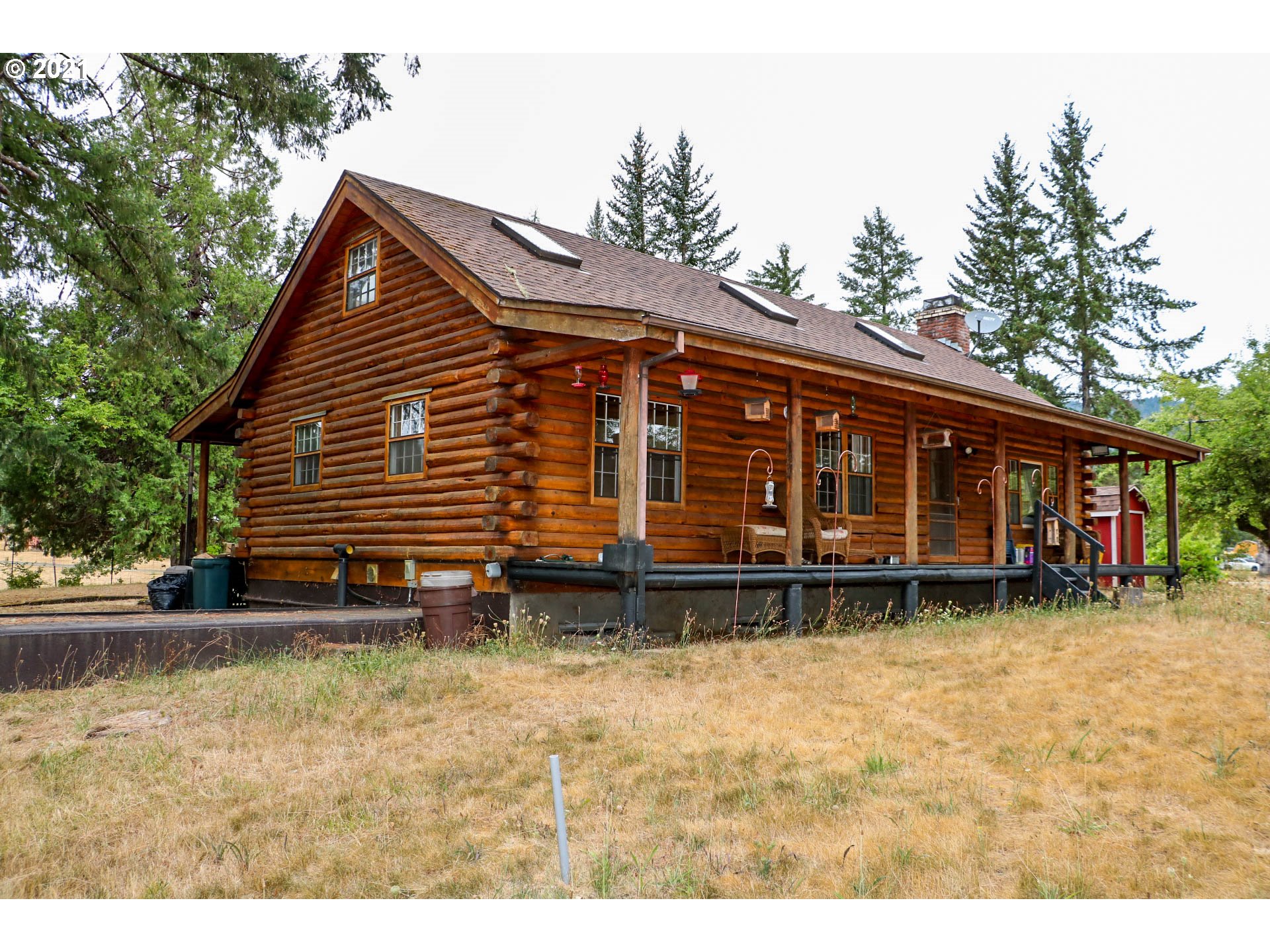 333 Coates Road Tenmile, OR 97481 - Photo 23 of 27 a view of a house with a yard