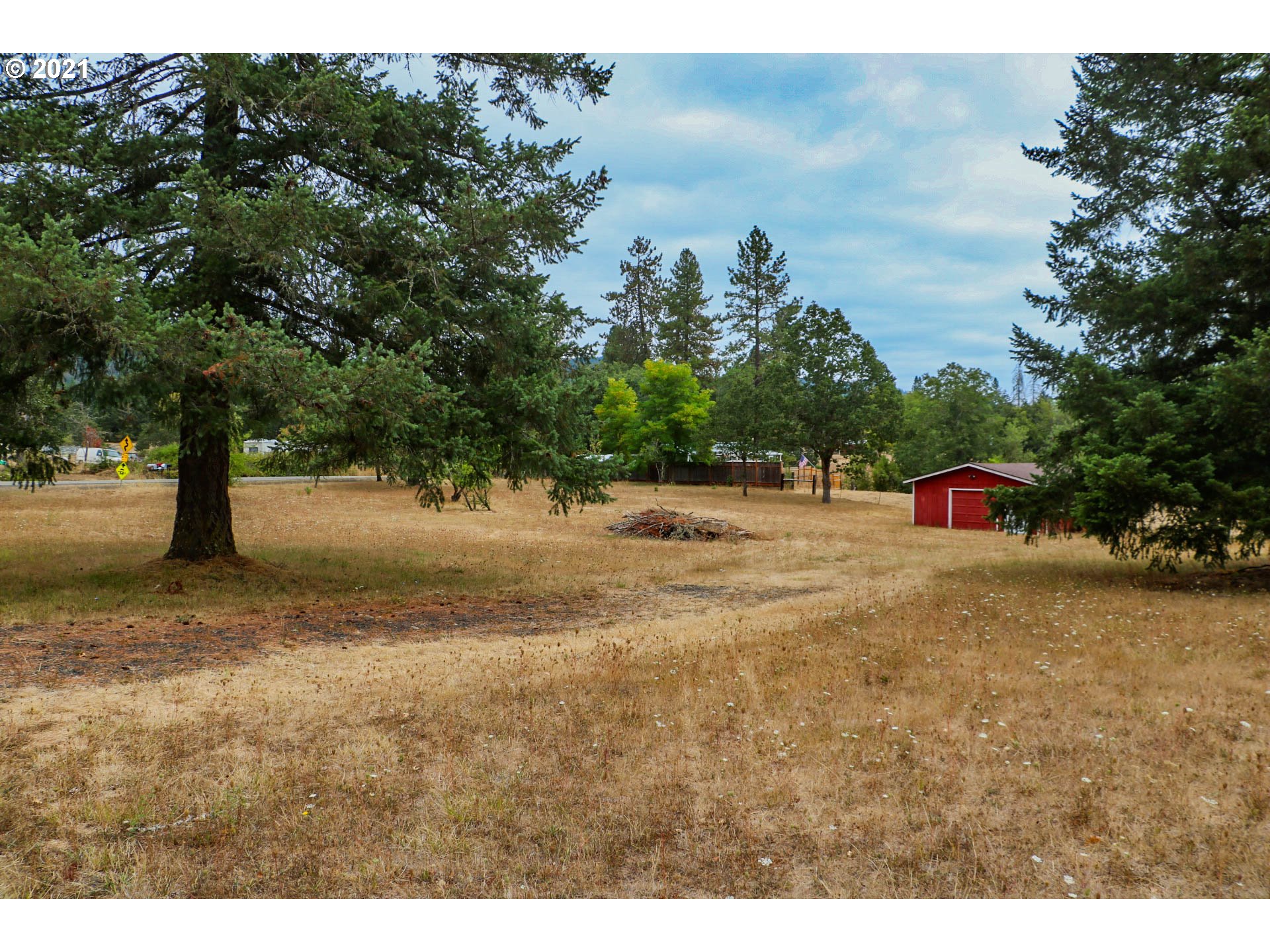 333 Coates Road Tenmile, OR 97481 - Photo 25 of 27 a view of road with large trees