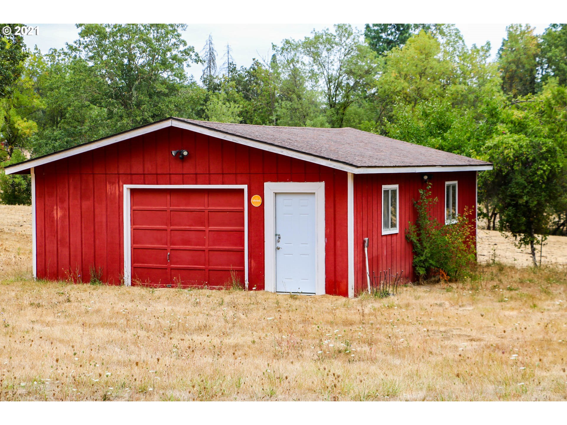333 Coates Road Tenmile, OR 97481 - Photo 27 of 27 a view of a house with a backyard