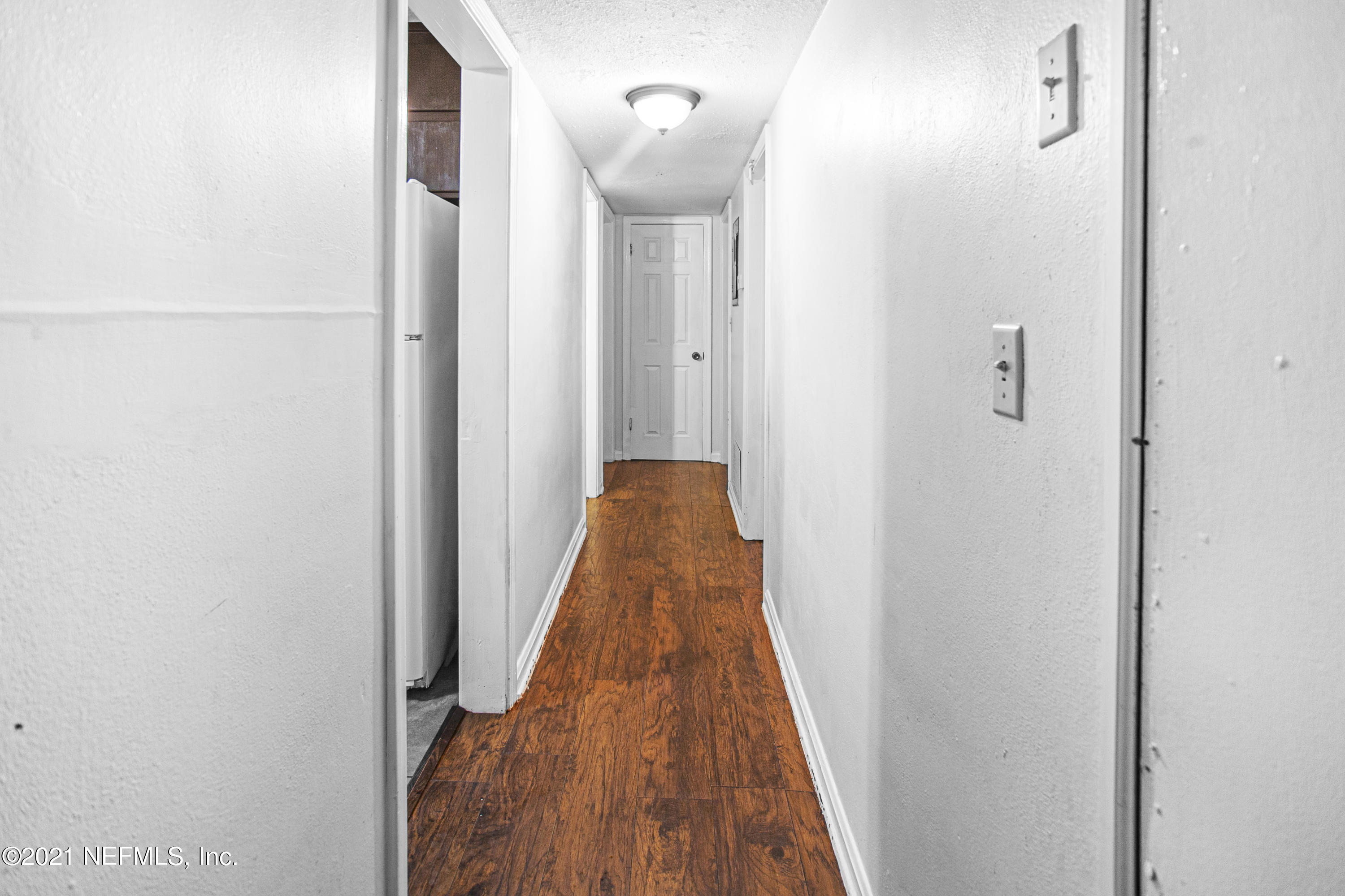 4434 Rainer Road Jacksonville, FL 32210 - Photo 10 of 20 Hallway to 3 Bedrooms