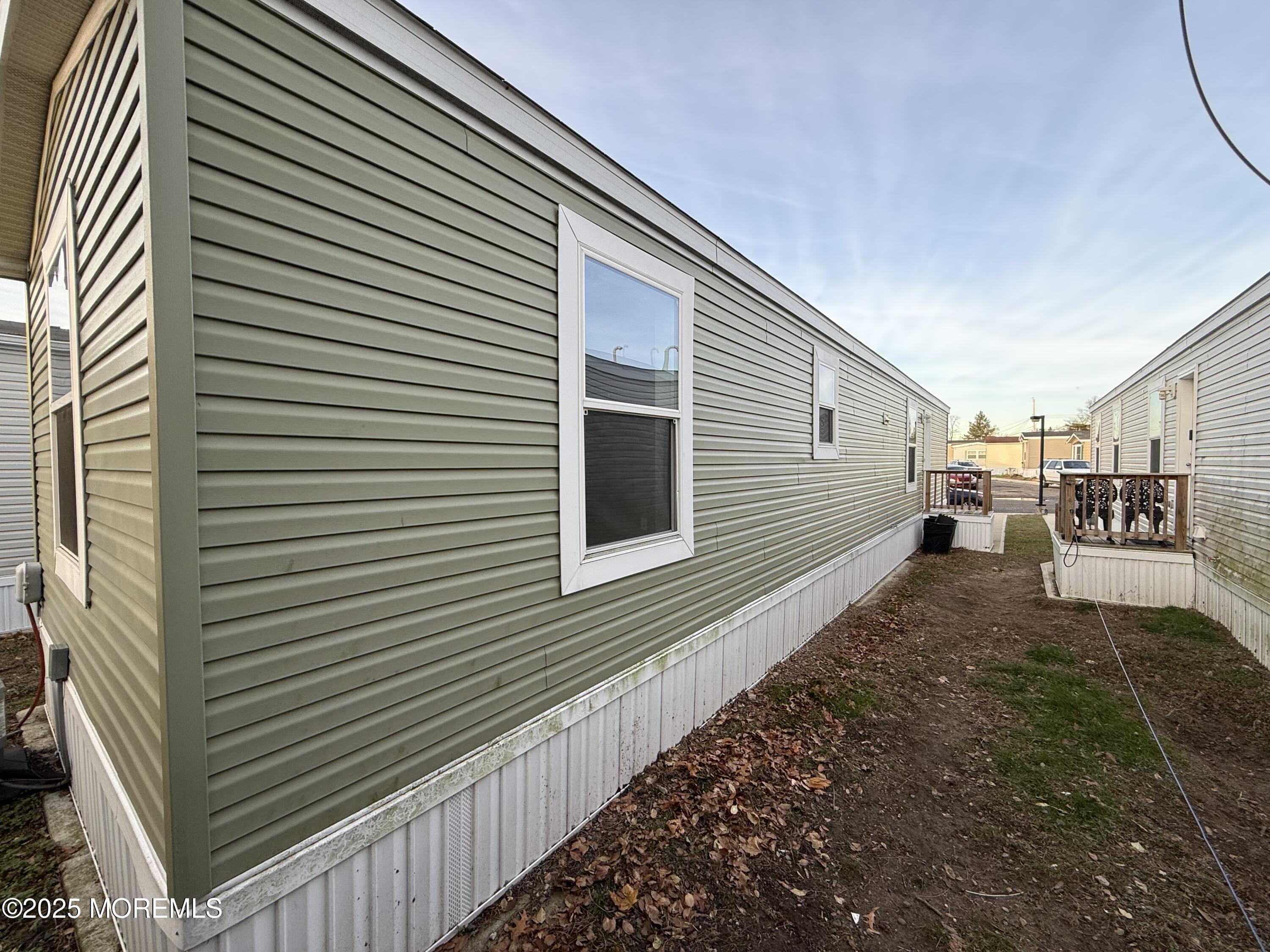 7 John Street Keansburg, NJ 07734 - Photo 13 of 16 a view of a back yard of the house