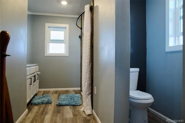 a bathroom with a sink and toilet