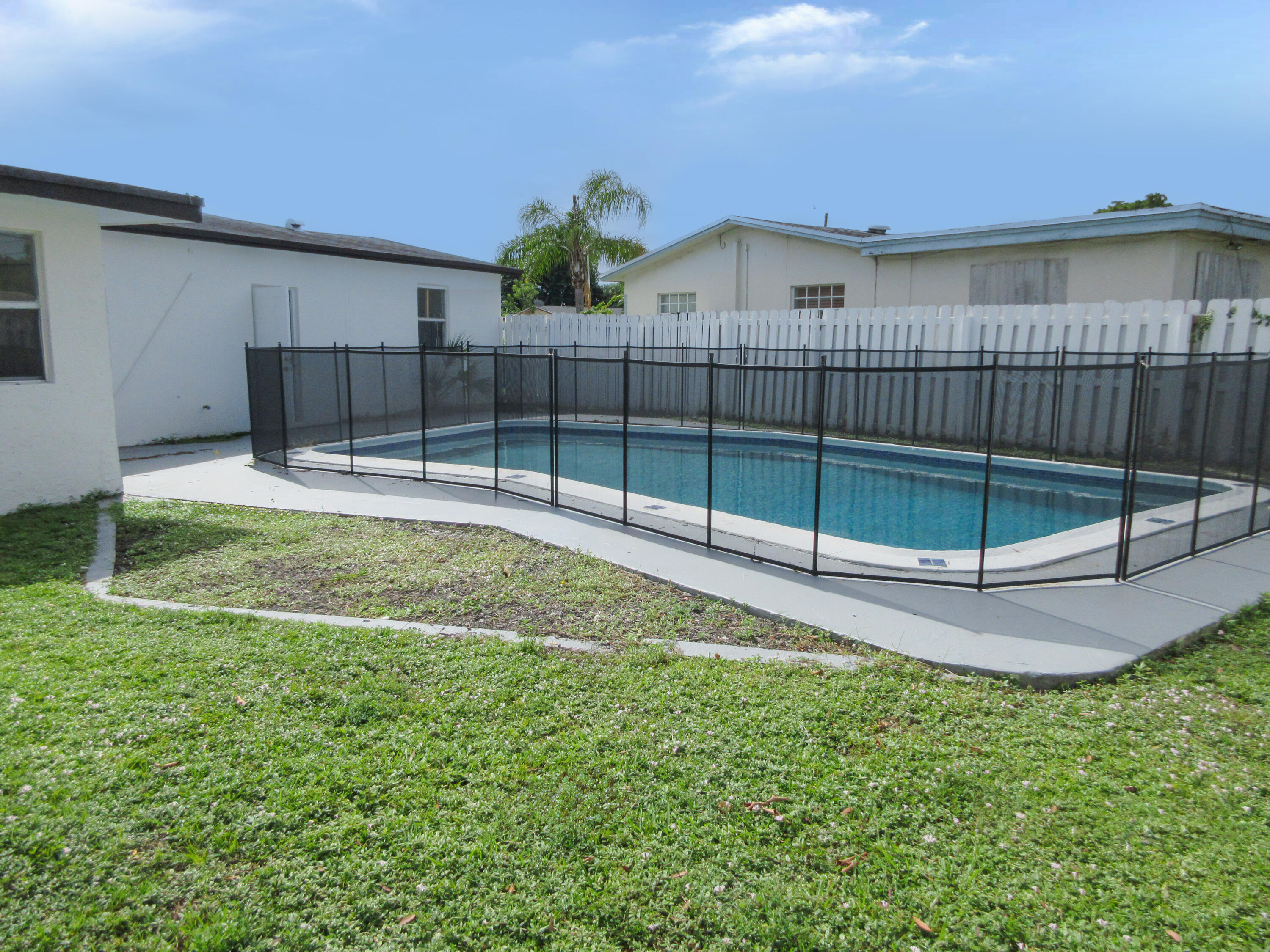 3801 Northwest 6th Street Lauderhill, FL 33311 - Photo 11 of 13 a view of a backyard