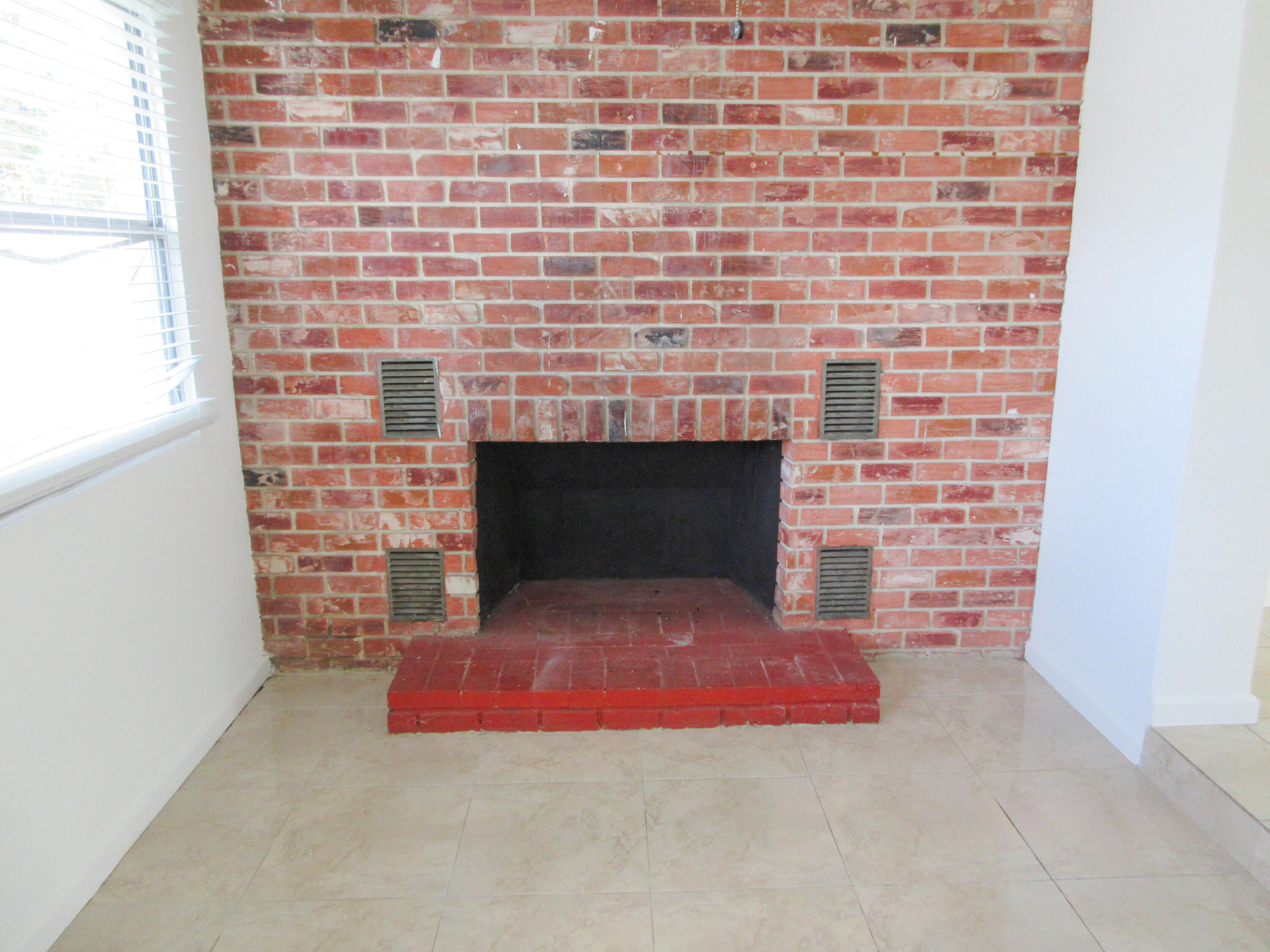3801 Northwest 6th Street Lauderhill, FL 33311 - Photo 4 of 13 a room with fireplace