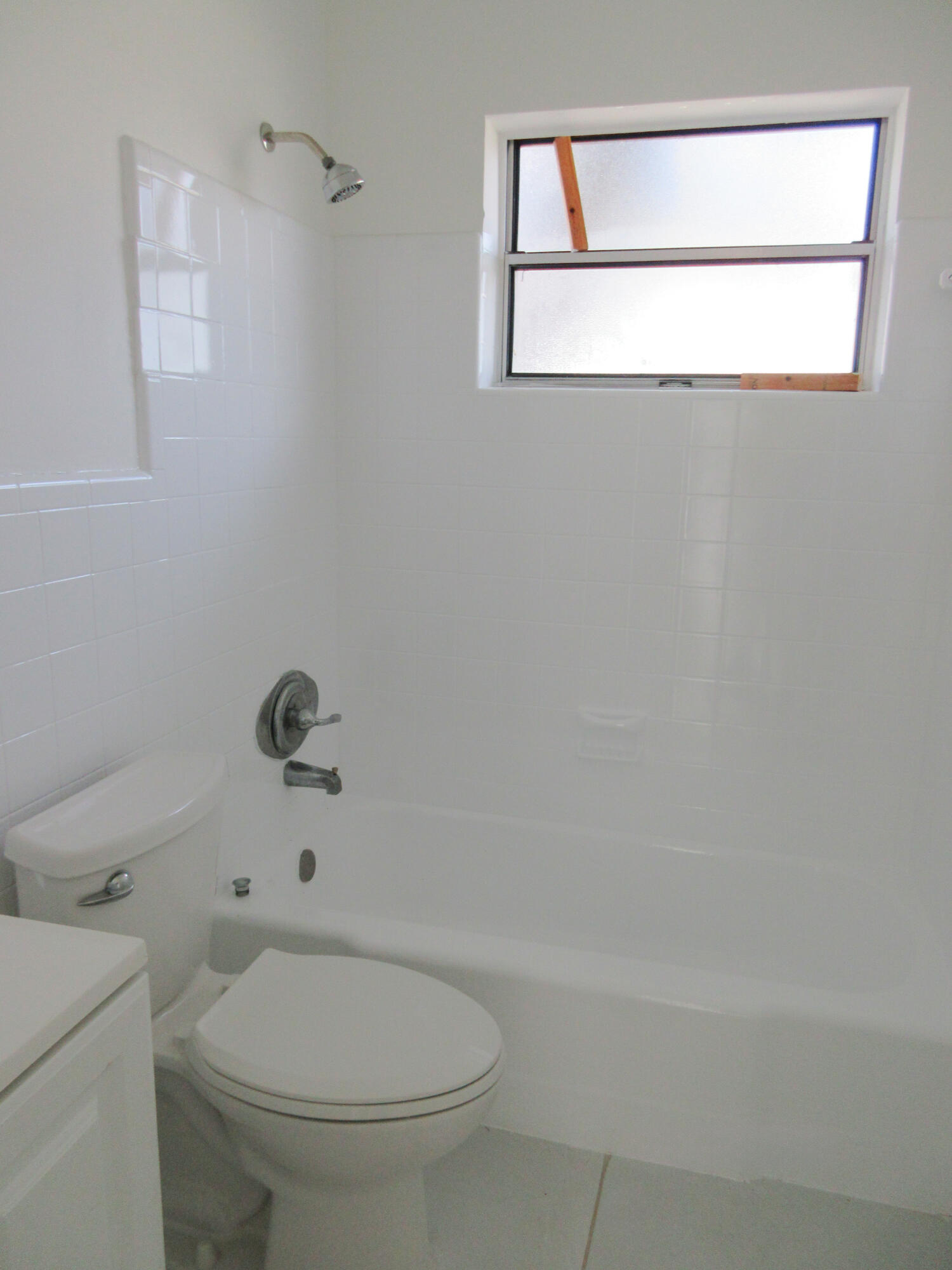 3801 Northwest 6th Street Lauderhill, FL 33311 - Photo 7 of 13 a bathroom with a toilet and a shower