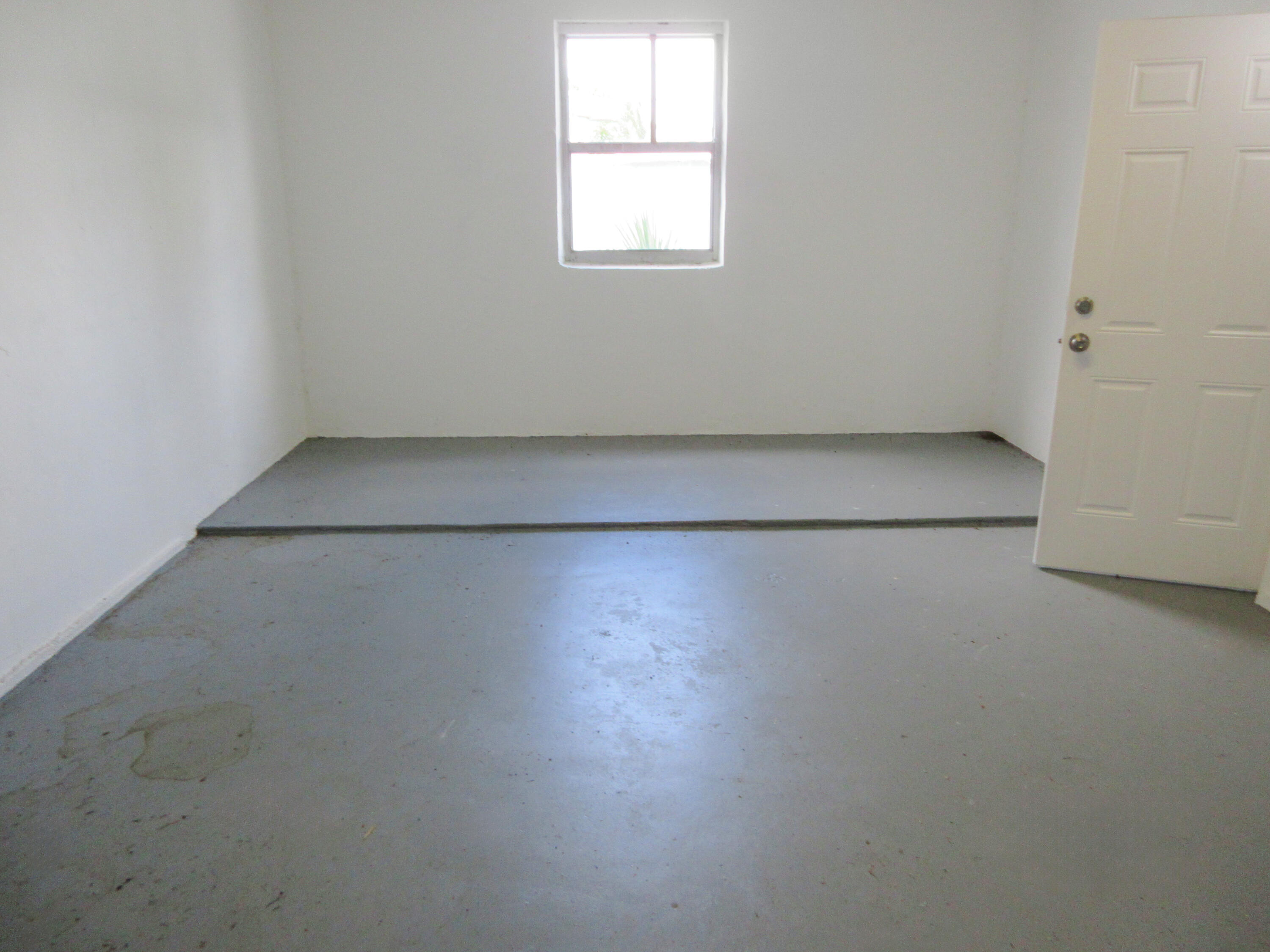 3801 Northwest 6th Street Lauderhill, FL 33311 - Photo 9 of 13 an empty room with a window