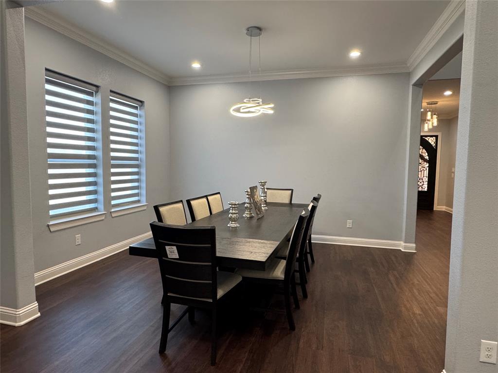 165 Circle Drive Combine, TX 75159 - Photo 6 of 10 a view of a dining room with furniture and wooden floor