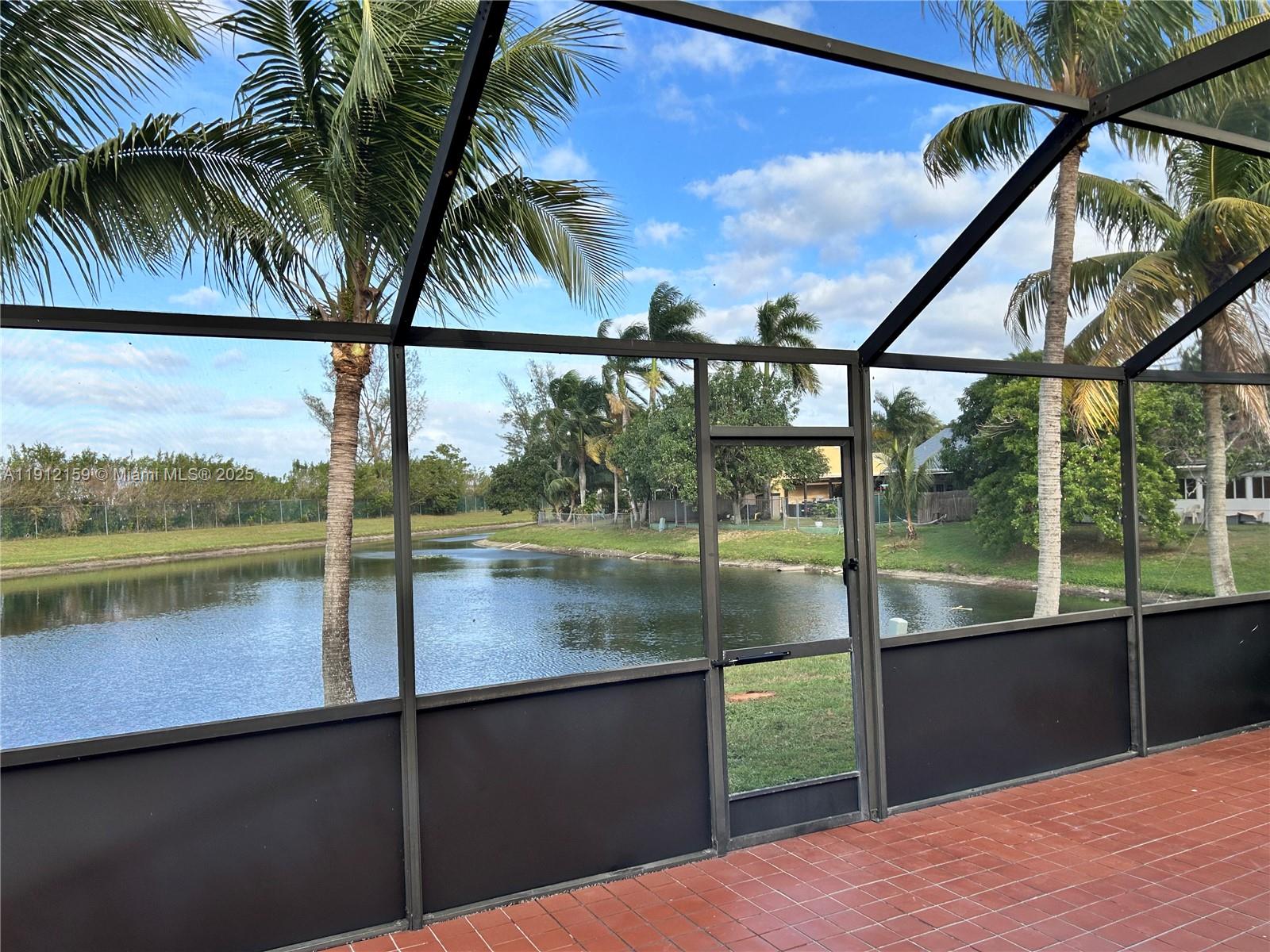 1111 Southwest 84th Terrace Pembroke Pines, FL 33025 - Photo 2 of 11 a view of lake from a balcony