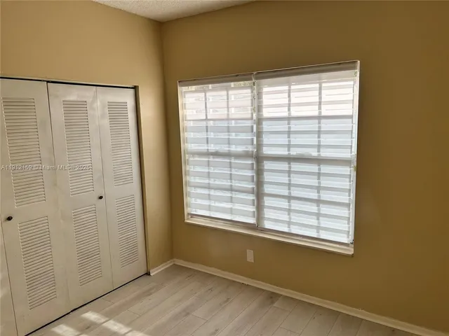 a bathroom with a shower and a bathtub