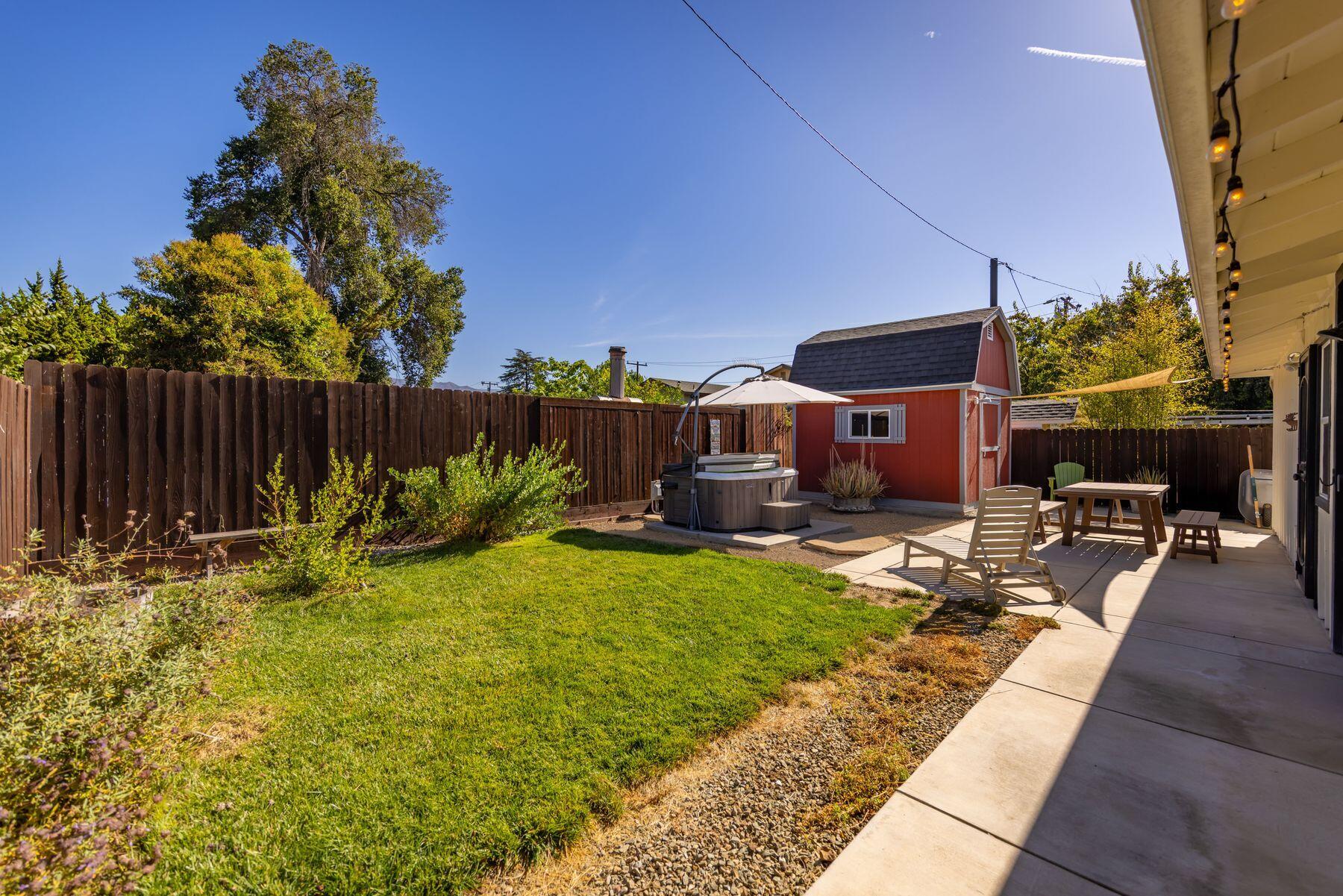 351 Sunset Avenue Oak View, CA 93022 - Photo 13 of 39 a backyard of a house with table and chairs
