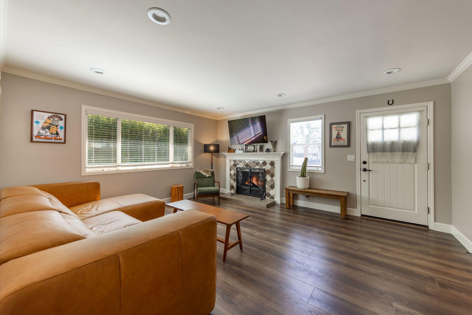 351 Sunset Avenue Oak View, CA 93022 - Photo 9 of 39 a living room with furniture and a fireplace