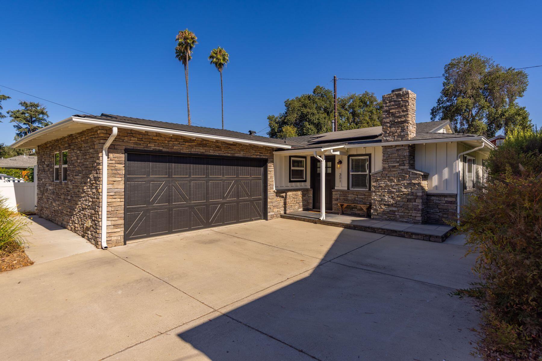 351 Sunset Avenue Oak View, CA 93022 - Photo 10 of 39 a front view of a house with a yard and garage