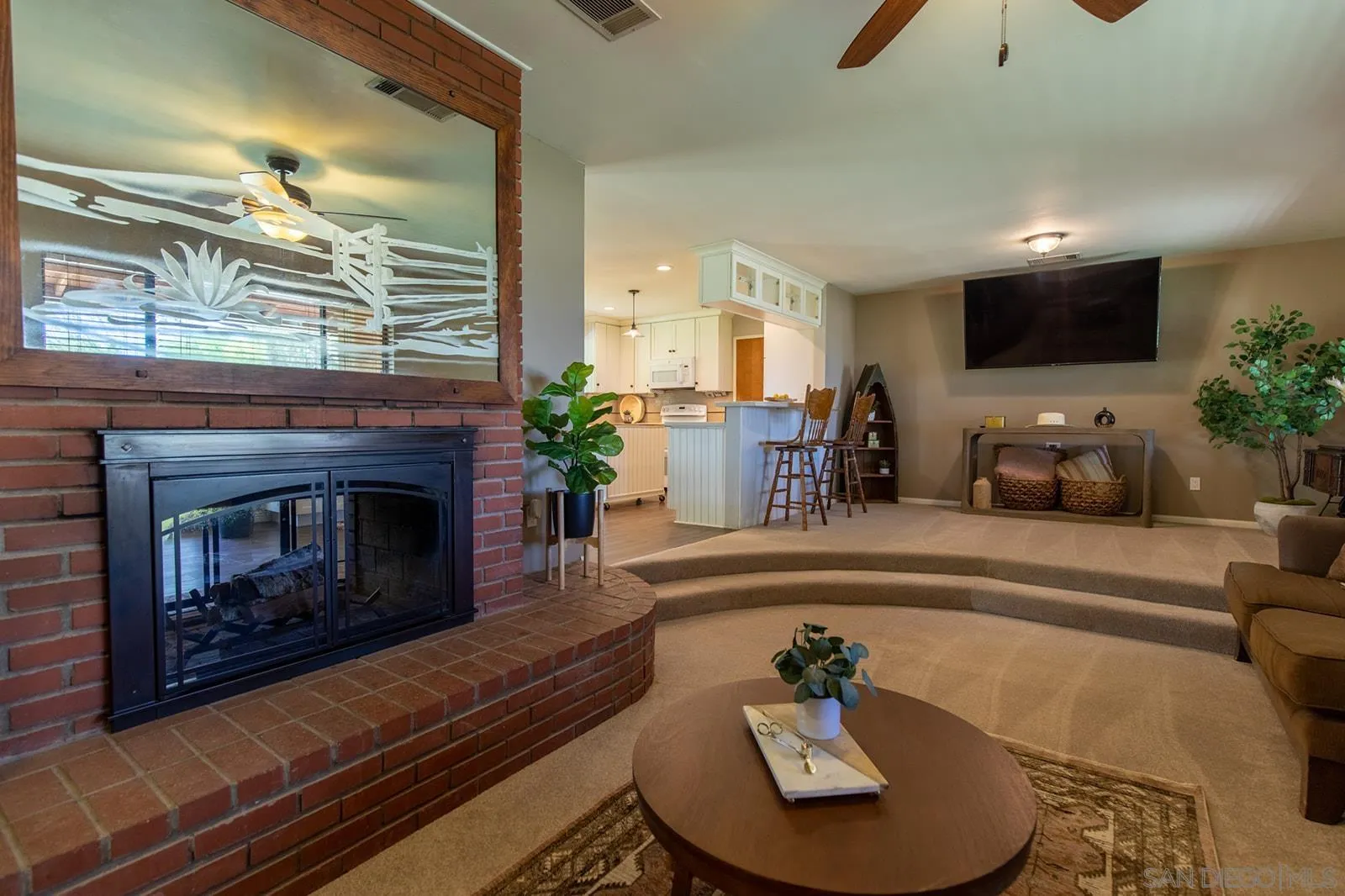 5754 Brandt Road Brawley, CA 92227 - Photo 12 of 48 a living room with furniture and a fireplace
