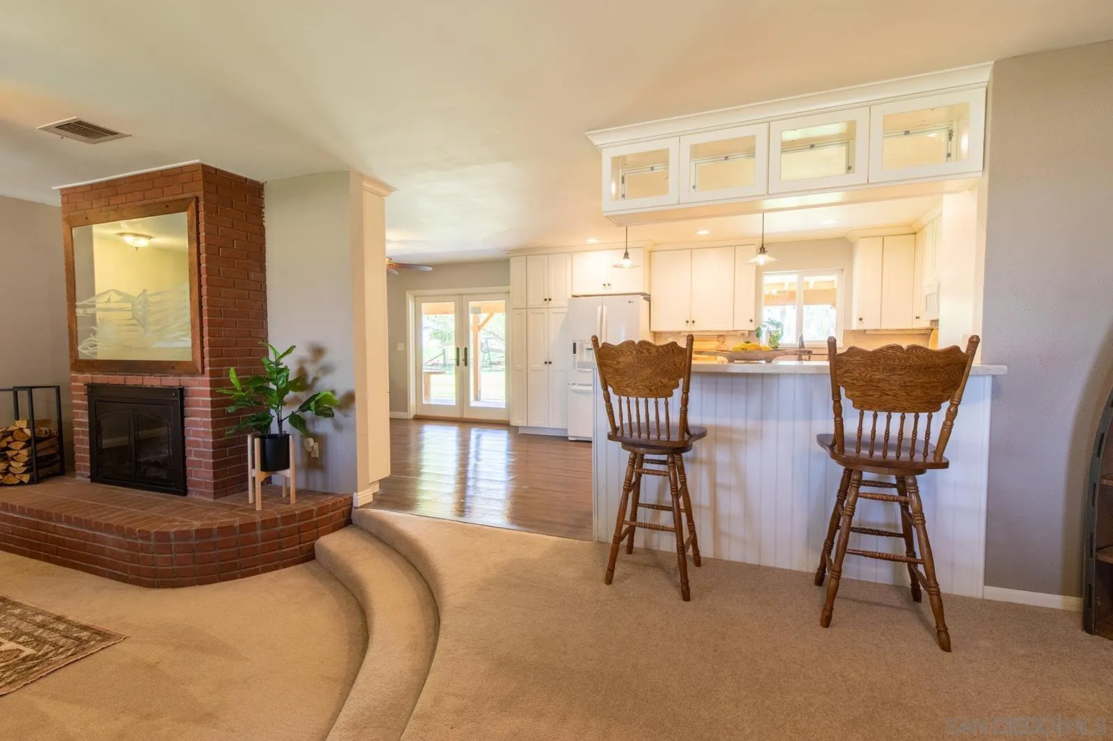 5754 Brandt Road Brawley, CA 92227 - Photo 13 of 48 a bedroom with a bed and a chandelier