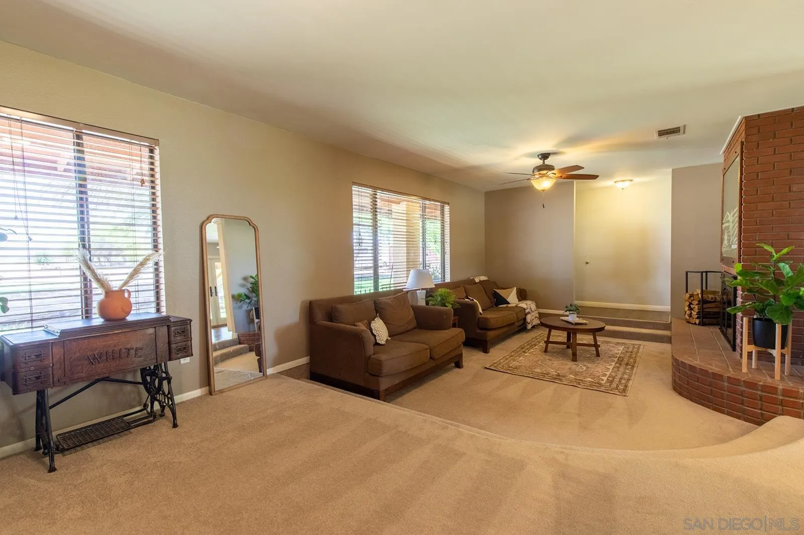 5754 Brandt Road Brawley, CA 92227 - Photo 14 of 48 a living room with furniture and a window