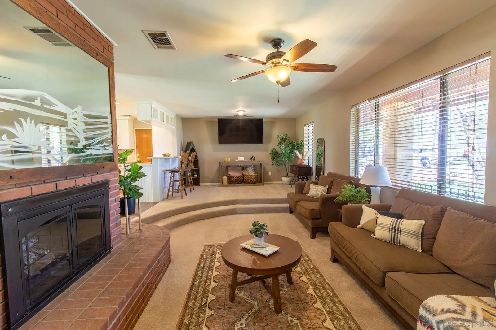 5754 Brandt Road Brawley, CA 92227 - Photo 15 of 48 a living room with furniture and a fireplace