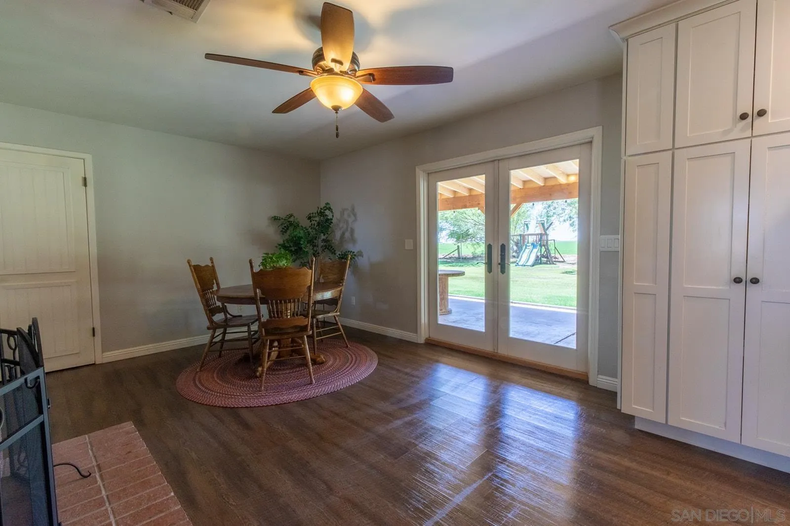 5754 Brandt Road Brawley, CA 92227 - Photo 16 of 48 a view of a dining room with furniture window and wooden floor