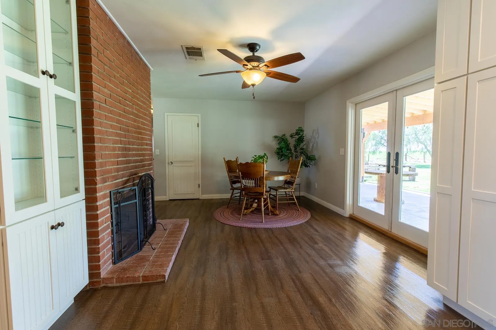 5754 Brandt Road Brawley, CA 92227 - Photo 17 of 48 a living room with furniture and a wooden floor