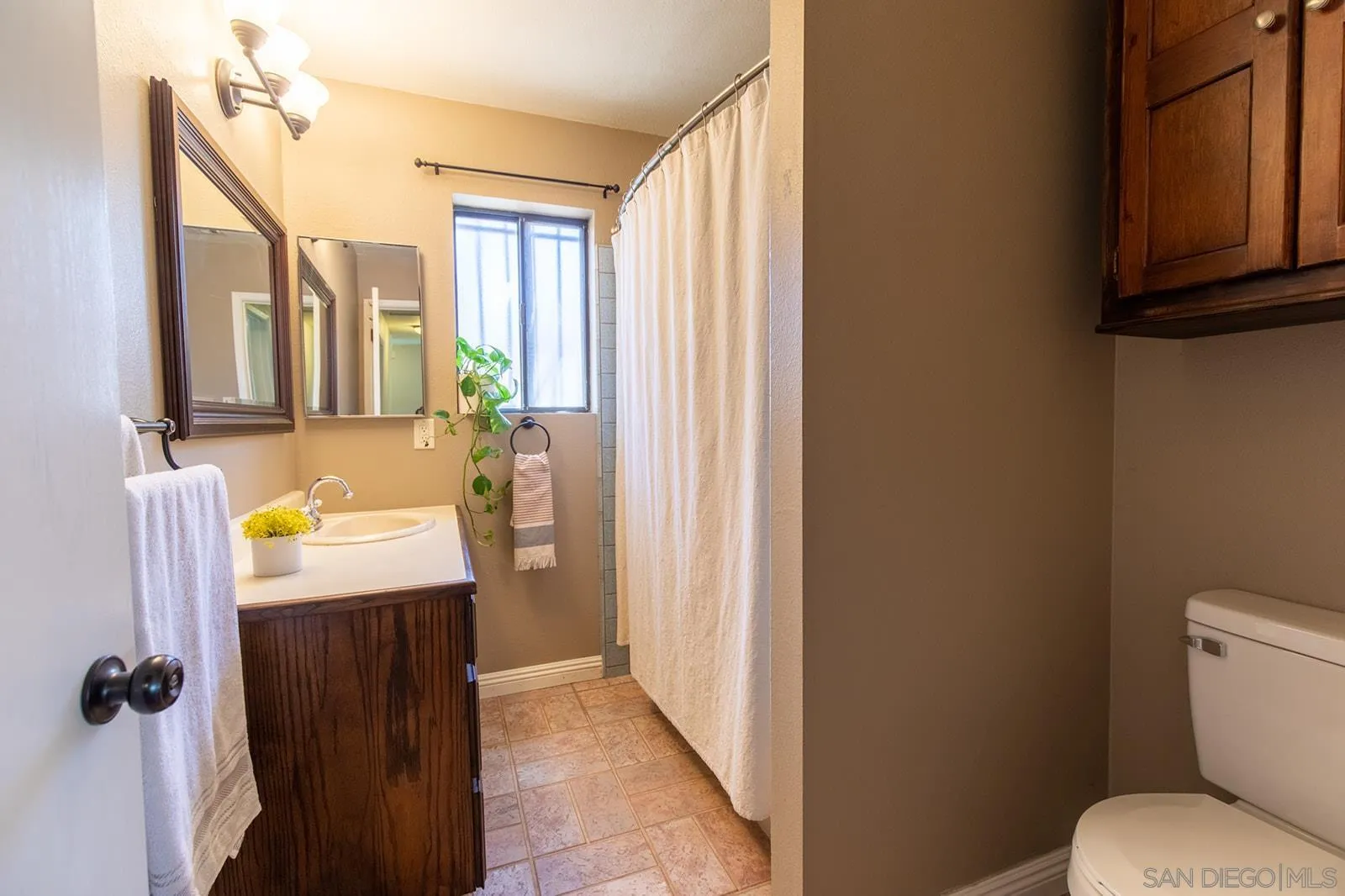 5754 Brandt Road Brawley, CA 92227 - Photo 28 of 48 a bathroom with a sink toilet and shower