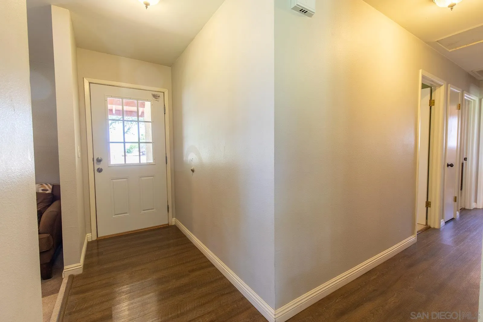 5754 Brandt Road Brawley, CA 92227 - Photo 3 of 48 a view of a hallway with wooden floor