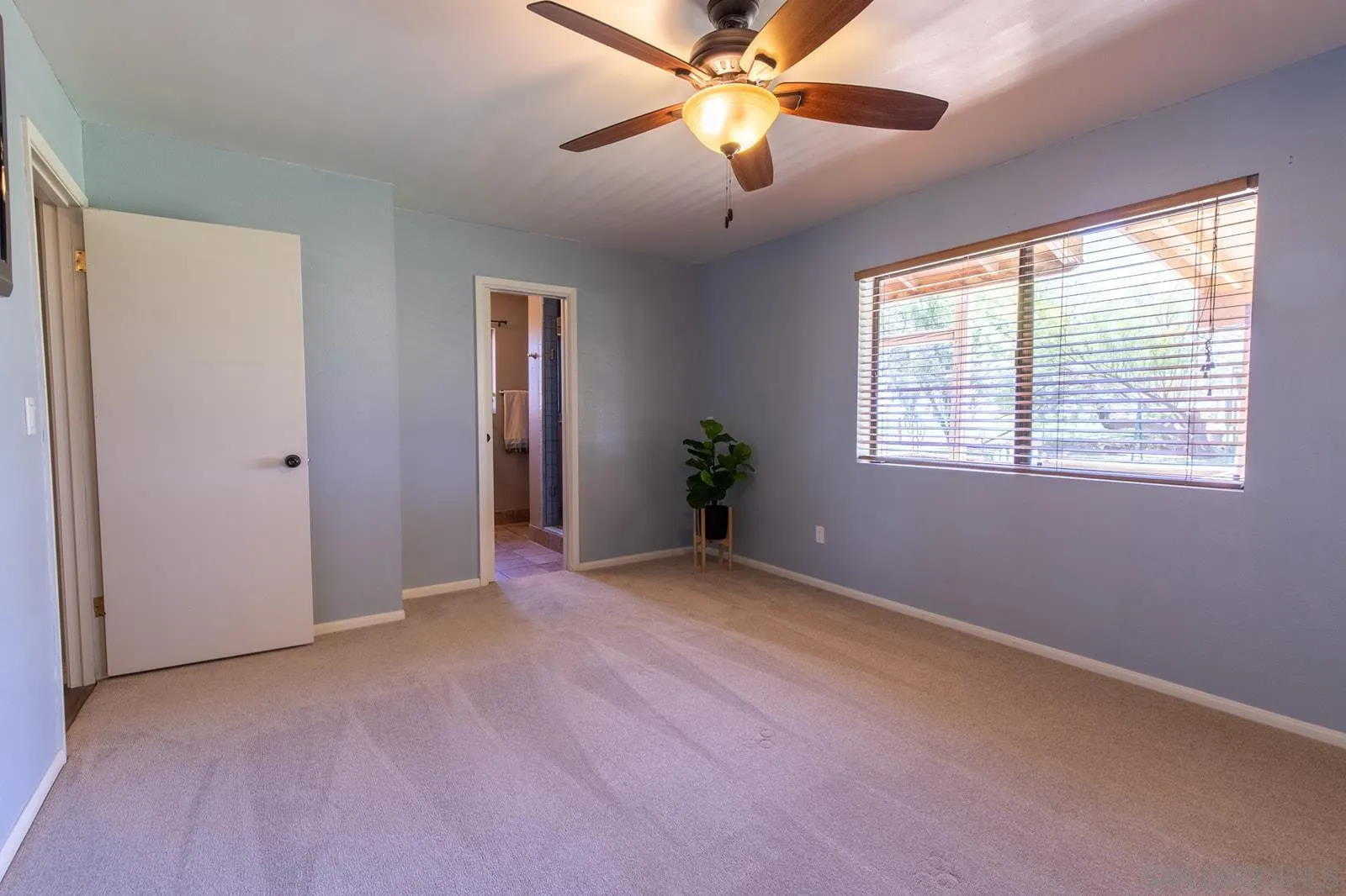 5754 Brandt Road Brawley, CA 92227 - Photo 33 of 48 an empty room with windows and fan